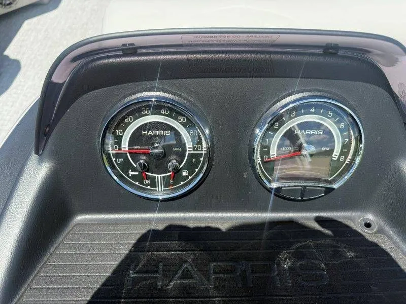 Slide: The Image of Dashboard of 2025 Harris Cruiser 210 FC with speedometer and tachometer. - 23