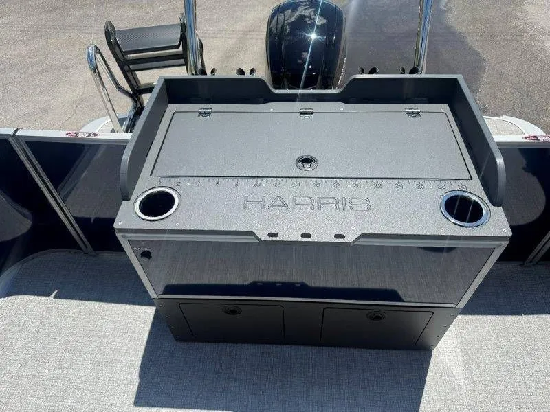 Slide: The Image of Harris Cruiser 210 FC 2025 with gray deck and storage area. - 27