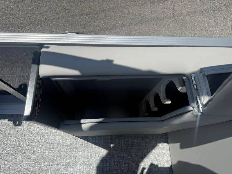 Slide: The Image of Interior of 2025 Harris Cruiser 210 FC with storage compartment. - 30