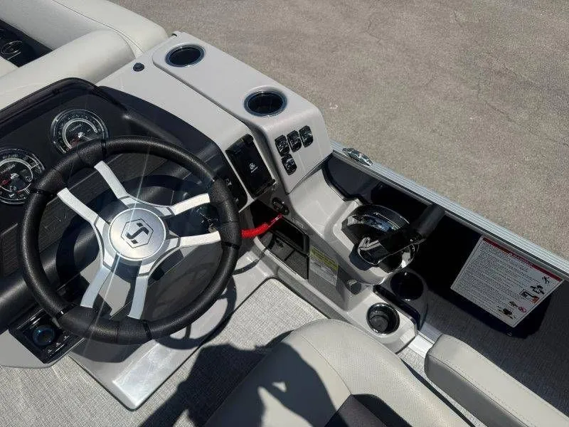 Slide: The Image of Interior view of 2025 Harris Cruiser 210 FC helm. - 31