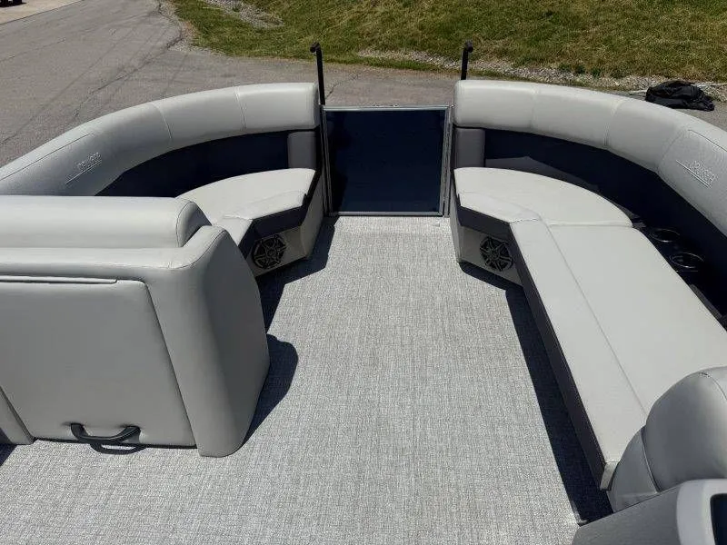 Slide: The Image of Interior of 2025 Harris Cruiser 210 FC with gray seating. - 36