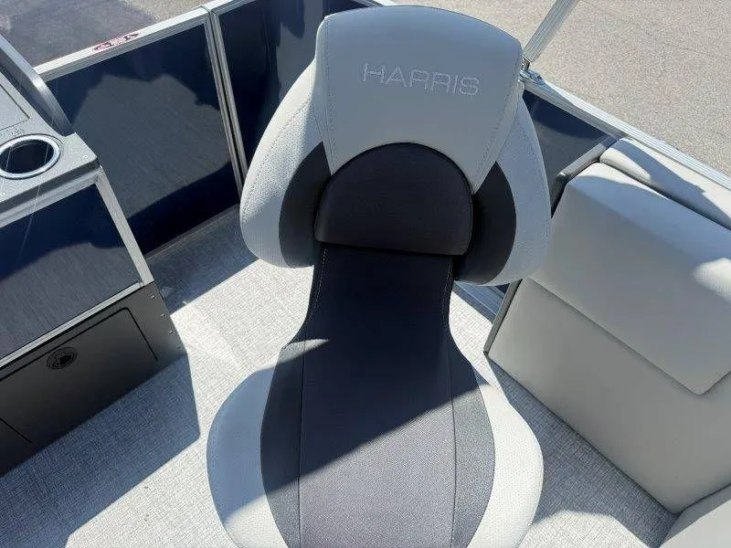 Slide: The Image of Harris Cruiser 210 FC 2025 boat seat with gray upholstery. - 37