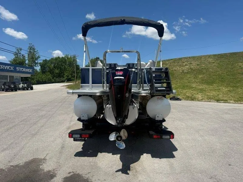 Slide: The Image of Harris Cruiser 210 FC 2025 on trailer, rear view in sunny weather. - 46