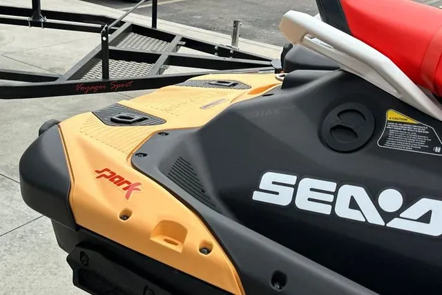 Slide: The Image of 2026 Sea-Doo PWC SPARK, orange-black, on trailer. - 10