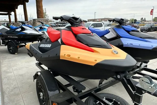 Slide: The Image of 2026 Sea-Doo PWC SPARK on trailer, multicolored design. - 19