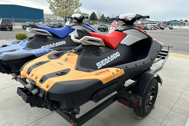 Slide: The Image of 2026 Sea-Doo PWC SPARK on trailer, orange and blue models. - 22