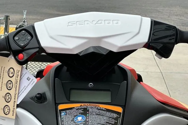 Slide: The Image of Handlebars of a 2026 Sea-Doo PWC SPARK with controls. - 32