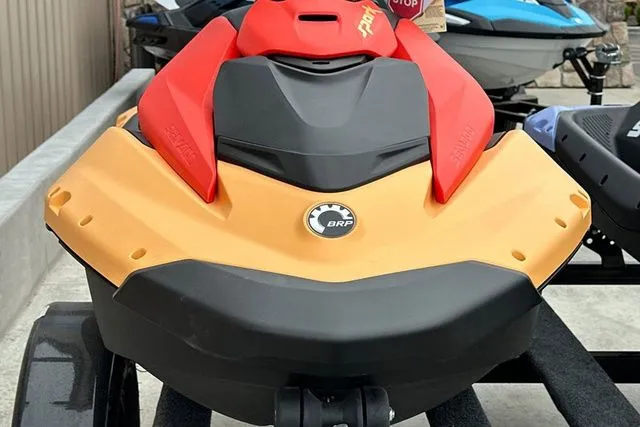 Slide: The Image of 2026 Sea-Doo PWC SPARK in red and yellow on trailer. - 6