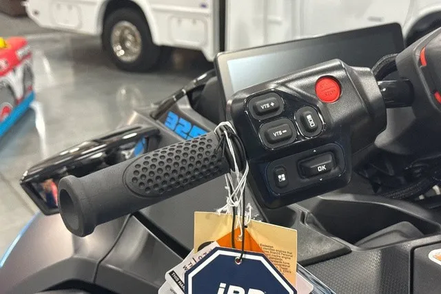 Slide: The Image of Close-up of a Sea-Doo PWC RXT X 325 handlebar with control buttons and tags. - 14