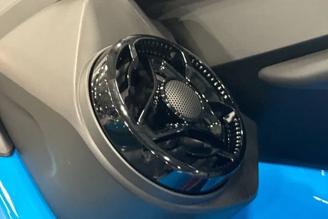 Slide: The Image of Close-up of a black speaker on a blue Sea-Doo watercraft. - 24