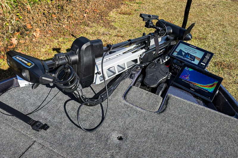 Slide: The Image of 2026 Bass Cat Lynx STS boat with advanced navigation and fish-finding technology. - 13