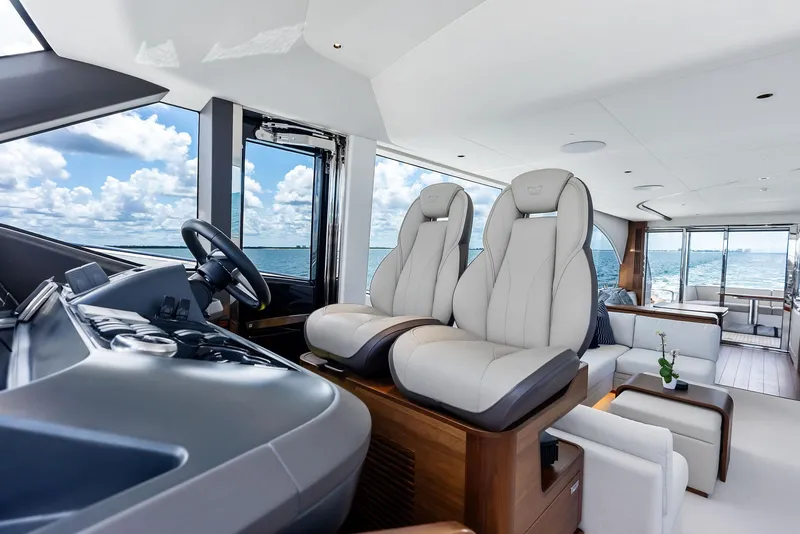 Slide: The Image of Luxurious interior of 2024 Princess Y72 Motor Yacht with plush seating and ocean view. - 19