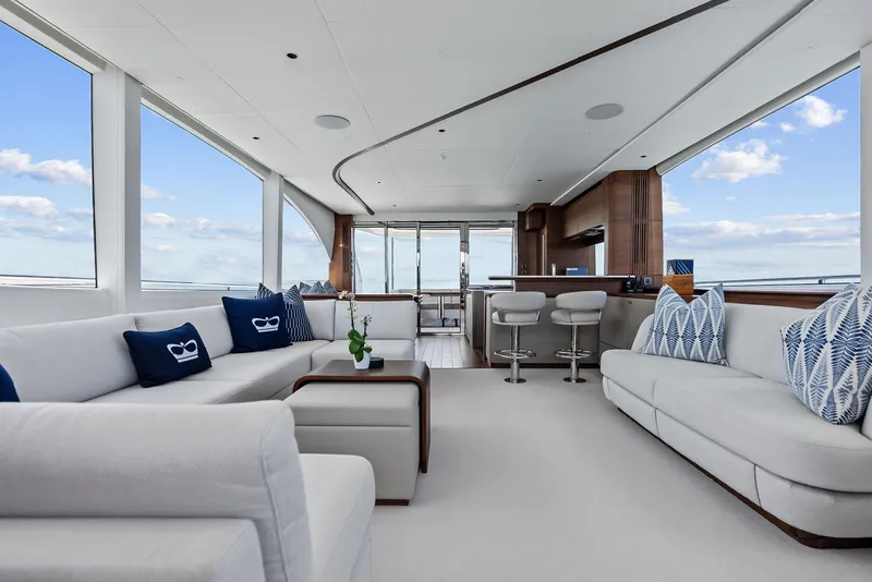 Slide: The Image of Luxurious interior of 2024 Princess Y72 Motor Yacht with modern seating and panoramic windows. - 2