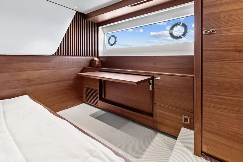 Slide: The Image of Luxurious interior of 2024 Princess Y72 Motor Yacht with elegant wood finish and ocean view. - 21