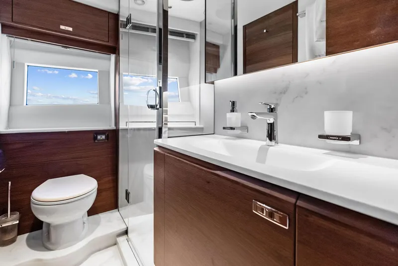 Slide: The Image of Luxurious bathroom in 2024 Princess Y72 Motor Yacht with modern fixtures and elegant design. - 26