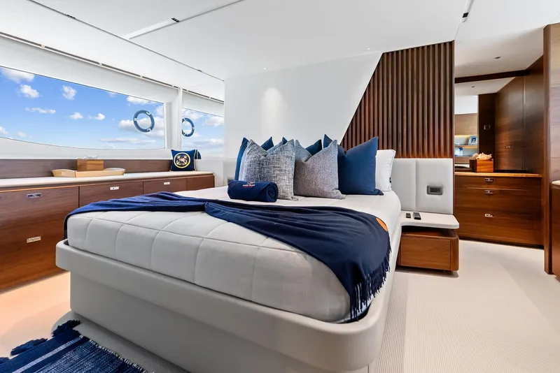 Slide: The Image of Luxurious bedroom interior of 2024 Princess Y72 Motor Yacht with elegant decor and ocean view. - 29