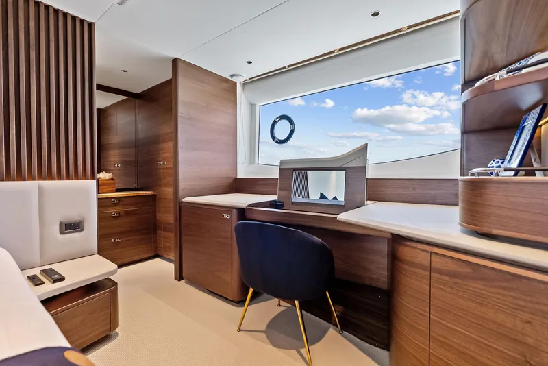 Slide: The Image of Luxurious interior of 2024 Princess Y72 Motor Yacht with elegant wood finishes and modern design. - 31