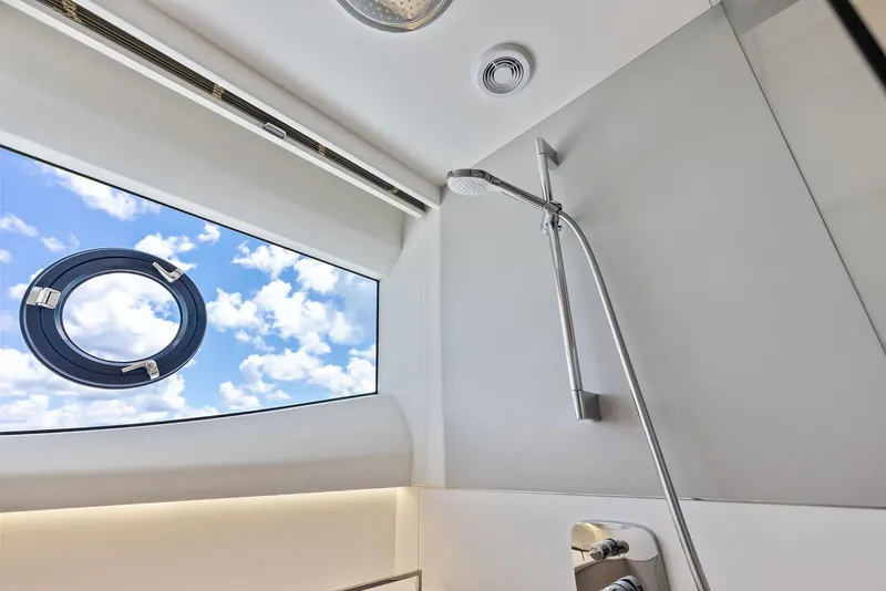 Slide: The Image of Luxurious shower area in 2024 Princess Y72 Motor Yacht with sky view window. - 34