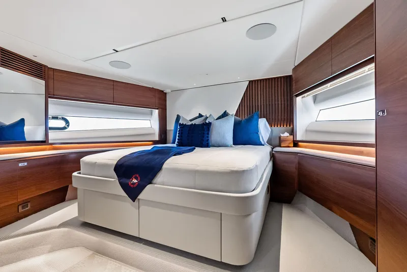Slide: The Image of Luxurious bedroom interior of 2024 Princess Y72 Motor Yacht with elegant wood finishes. - 40
