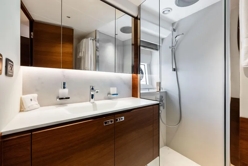 Slide: The Image of Luxurious bathroom in 2024 Princess Y72 Motor Yacht with modern fixtures and elegant design. - 42