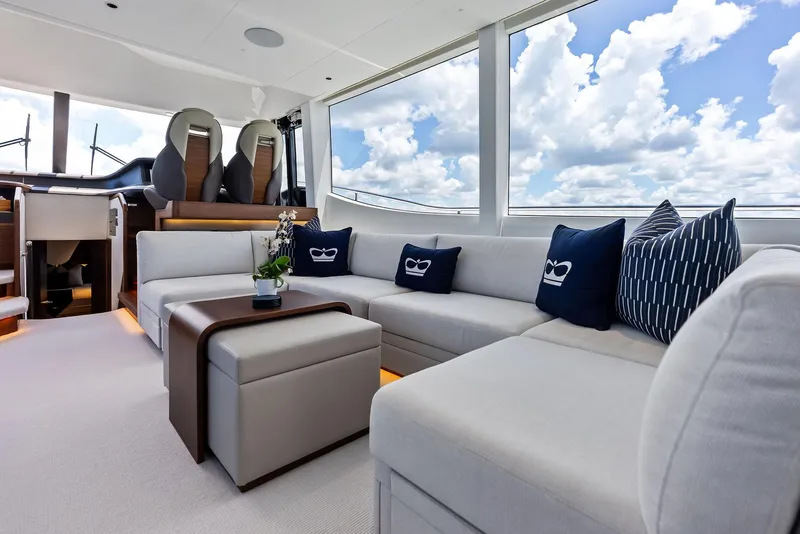 Slide: The Image of Luxurious interior of 2024 Princess Y72 Motor Yacht with plush seating and scenic views. - 49