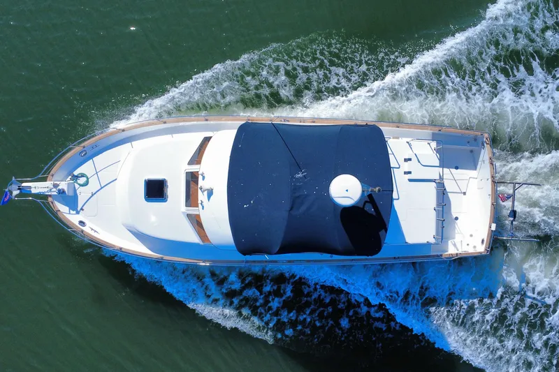 Slide: The Image of Aerial view of 2006 Albin 40 North Sea Cutter cruising on water. - 15