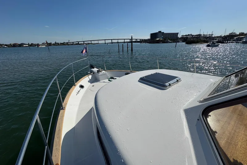 Slide: The Image of 2006 Albin 40 North Sea Cutter on calm waters with scenic bridge view. - 17