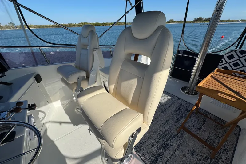 Slide: The Image of Interior of 2006 Albin 40 North Sea Cutter with beige seating and ocean view. - 34