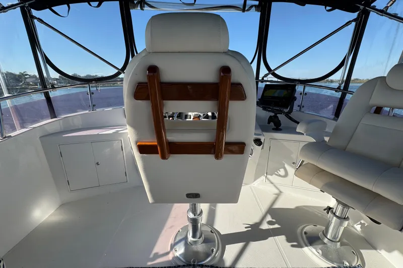 Slide: The Image of Interior of 2006 Albin 40 North Sea Cutter with helm chairs and navigation equipment. - 37