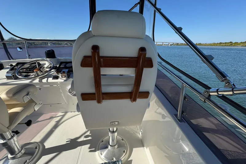 Slide: The Image of Helm of 2006 Albin 40 North Sea Cutter with steering wheel and captain's chair. - 38