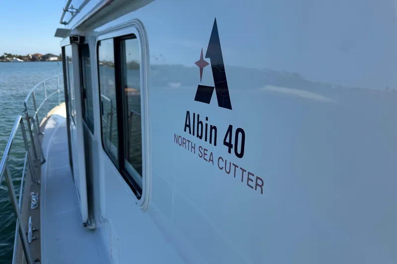 Slide: The Image of 2006 Albin 40 North Sea Cutter boat on calm water, side view. - 43