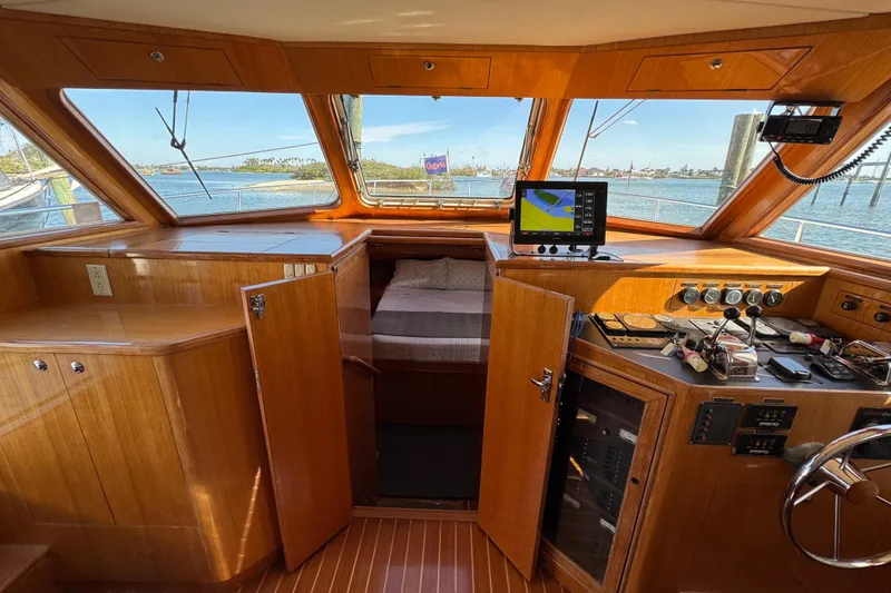 Slide: The Image of 2006 Albin 40 North Sea Cutter interior with navigation equipment and wooden finish. - 50