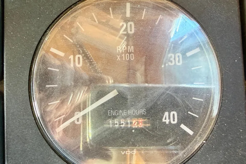 Slide: The Image of Close-up of Albin 40 North Sea Cutter tachometer showing 1551.28 engine hours. - 55