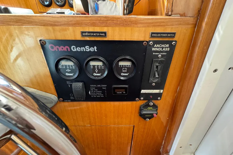 Slide: The Image of Control panel of a 2006 Albin 40 North Sea Cutter with Onan GenSet and anchor windlass. - 57