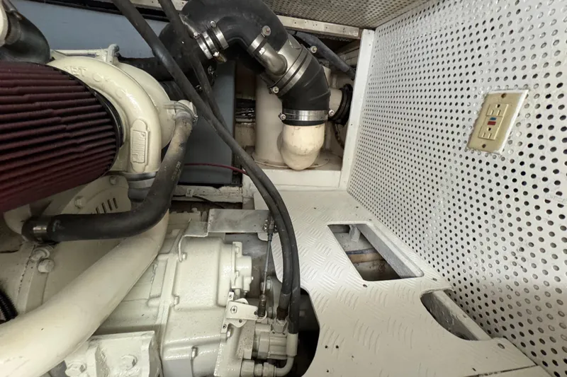 Slide: The Image of Engine room of 2006 Albin 40 North Sea Cutter with visible components and wiring. - 78