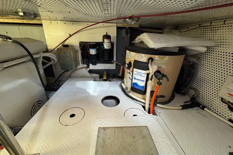 Slide: The Image of Engine room of 2006 Albin 40 North Sea Cutter with equipment and wiring. - 80