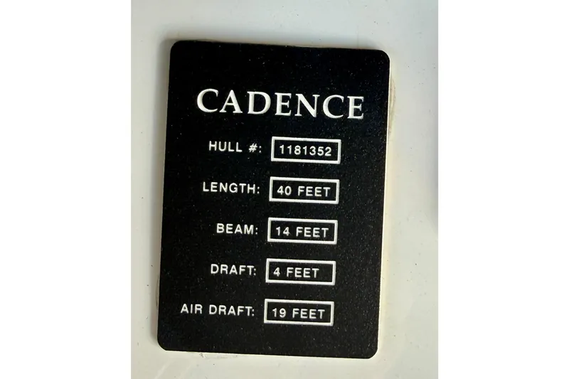 Slide: The Image of Plaque displaying specifications of 2006 Albin 40 North Sea Cutter, including hull number and dimensions. - 83