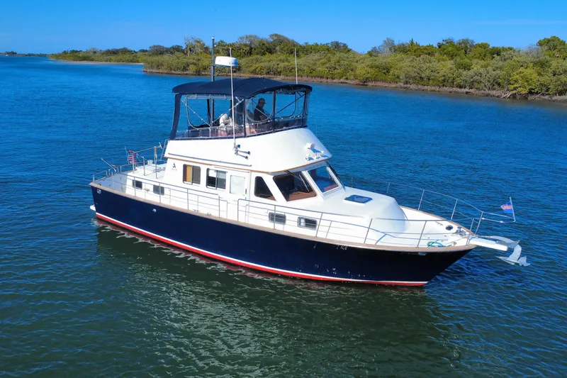 Slide: The Image of 2006 Albin 40 North Sea Cutter cruising on calm blue waters. - 9
