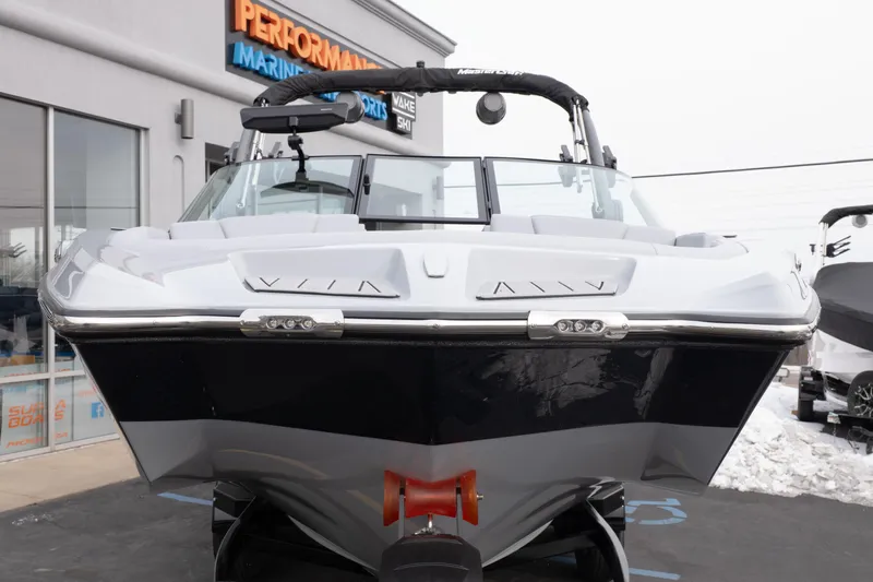 Slide: The Image of 2026 MasterCraft XT22 boat displayed at Performance Marine, front view. - 10