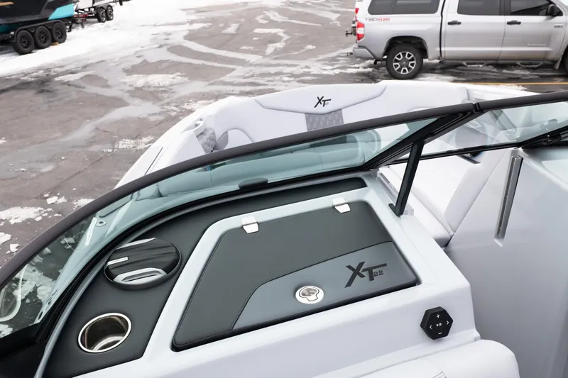 Slide: The Image of 2026 MasterCraft XT22 boat interior with sleek design and modern features. - 32