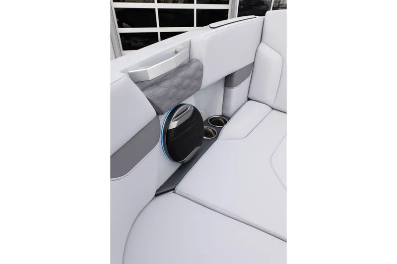 Slide: The Image of 2026 MasterCraft XT22 interior with sleek seating, cup holders, and modern design elements. - 37