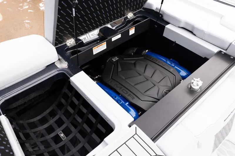 Slide: The Image of 2026 MasterCraft XT22 boat engine compartment with Ilmor engine, open hatch view. - 42