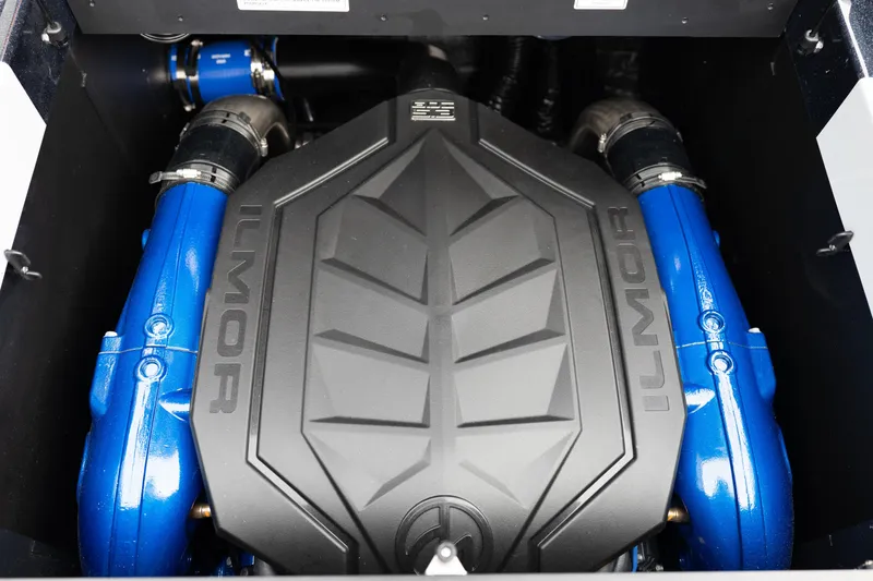 Slide: The Image of 2026 MasterCraft XT22 engine with Ilmor branding, featuring blue components and sleek design. - 43