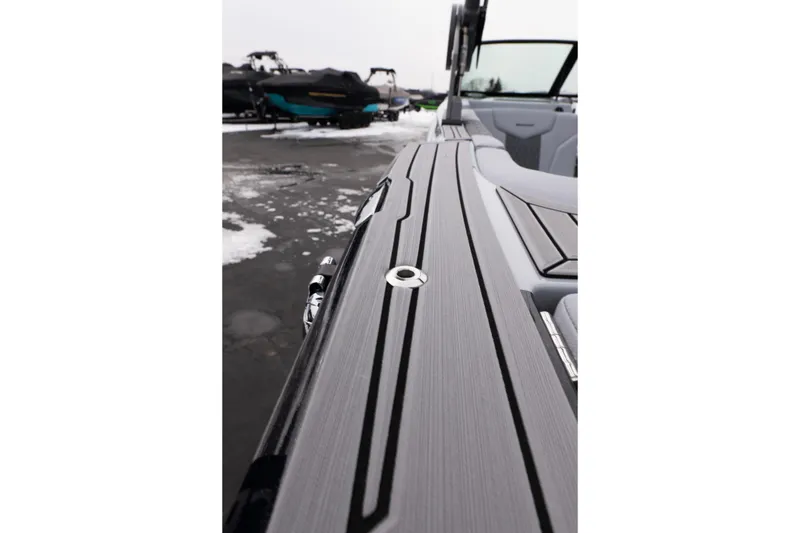 Slide: The Image of 2026 MasterCraft XT22 boat deck with sleek design and modern features. - 46