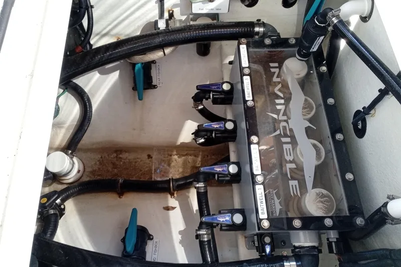 Slide: The Image of Engine compartment of 2022 Invincible 39 Open Fisherman boat, showcasing internal components. - 10