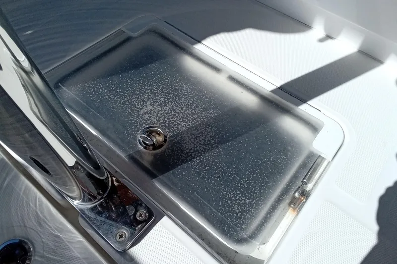 Slide: The Image of 2022 Invincible 39 Open Fisherman boat deck detail with stainless steel fittings. - 12