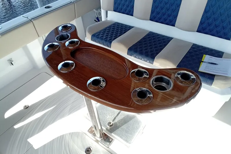 Slide: The Image of Luxury seating and rod holders on 2022 Invincible 39 Open Fisherman boat. - 17