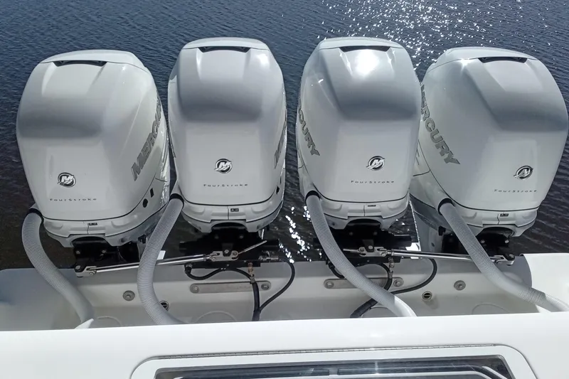 Slide: The Image of Four Mercury outboard engines on a 2022 Invincible 39 Open Fisherman boat. - 3