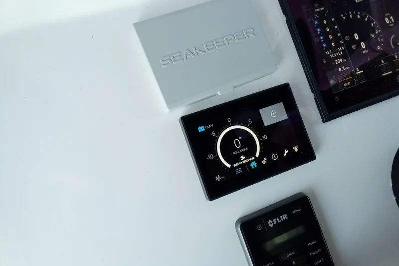 Slide: The Image of Control panel of 2022 Invincible 39 Open Fisherman with Seakeeper and FLIR systems. - 34