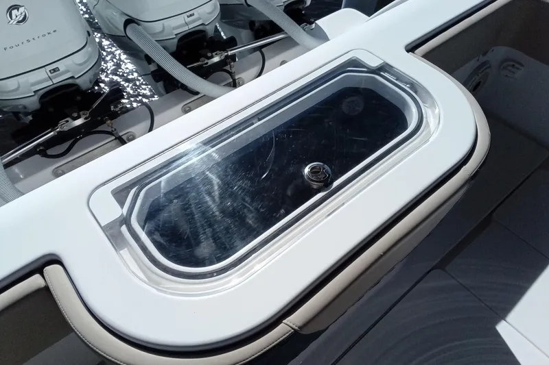 Slide: The Image of 2022 Invincible 39 Open Fisherman boat with sleek livewell and powerful outboard engines. - 4